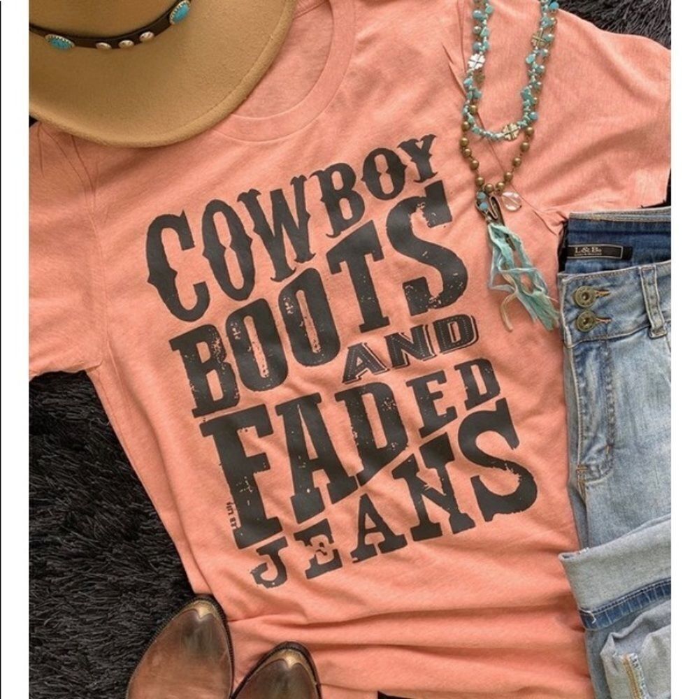 Cowboy boots and faded jeans T-shirt‎